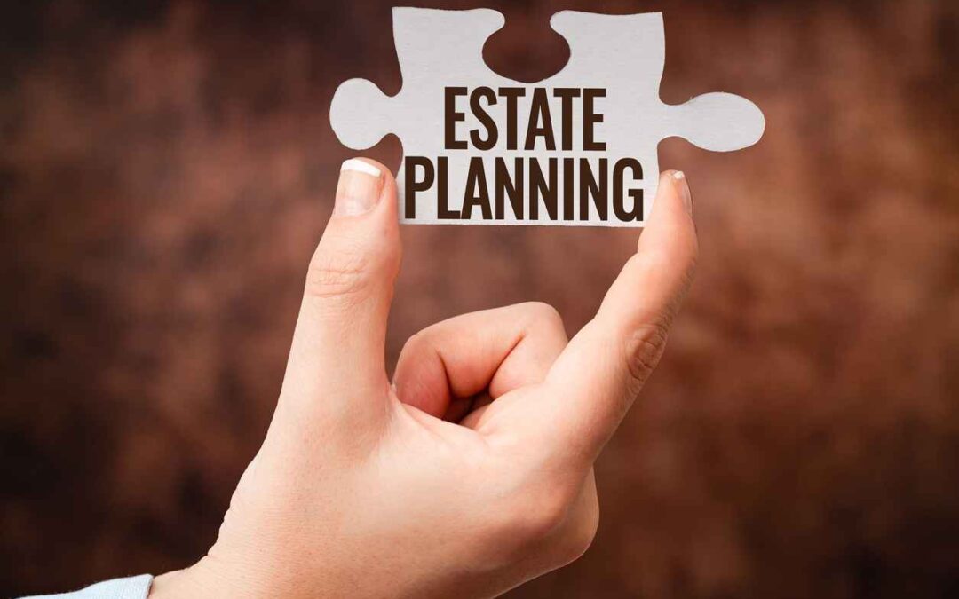 Holding a puzzle piece with the words "estate planning" on it