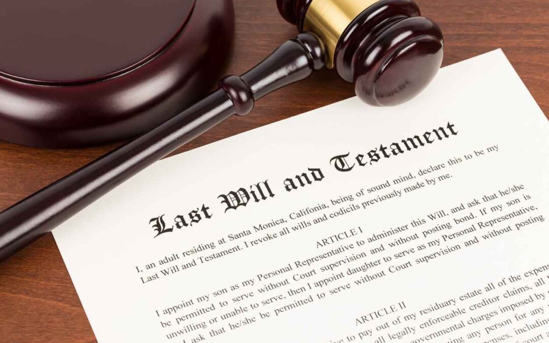 Last will and testament on yellowish paper with wooden judge gavel; document is mock-up